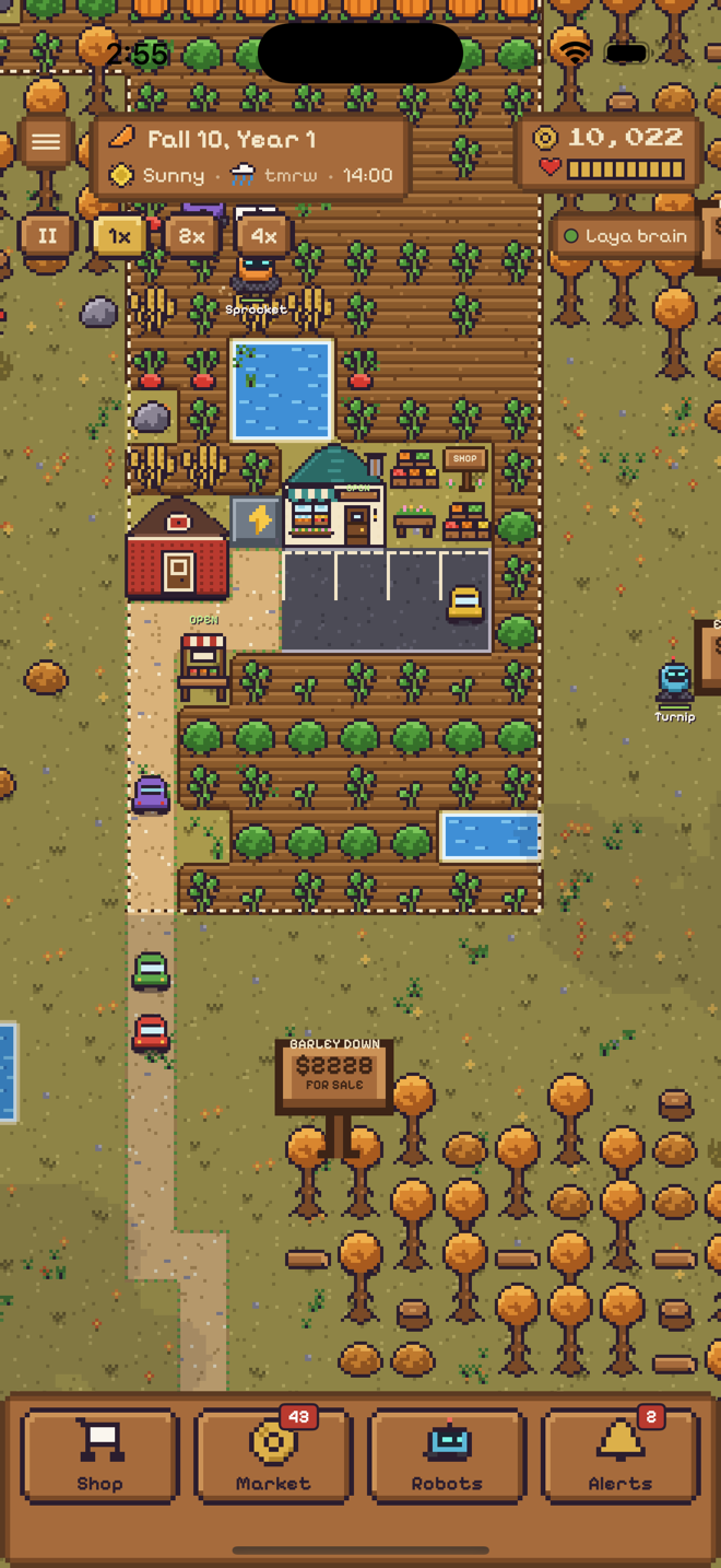 The farm in fall with a farm shop, a car park with customers, and pumpkin beds